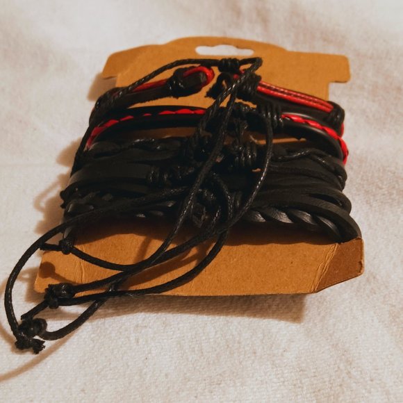 Multi Level leather bracelet features figure 8 and Money sign - Picture 3 of 6